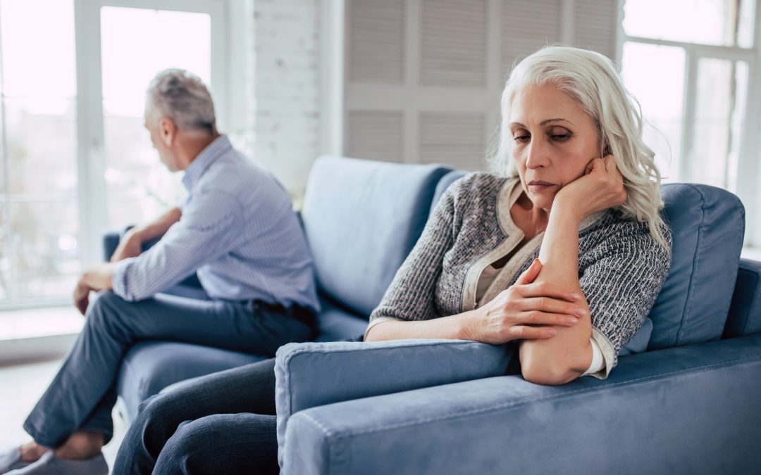 unhappy looking woman getting a divorce now discussing pension sharing