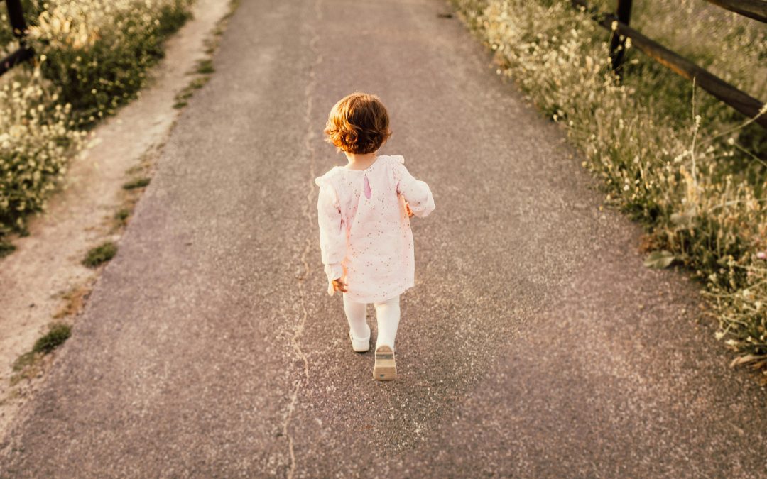 Child walks alone on road who may have been a victim of child abduction